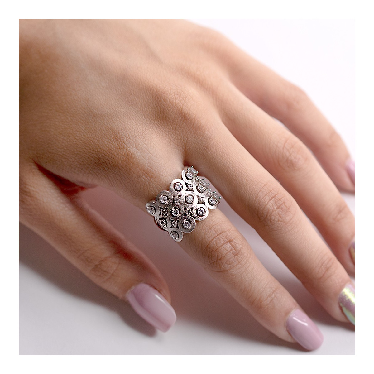 SILVER RING WITH CRIMPED ZIRCONIA